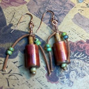 Patricia Healey barrels Earrings by Susan A Ray. Copper